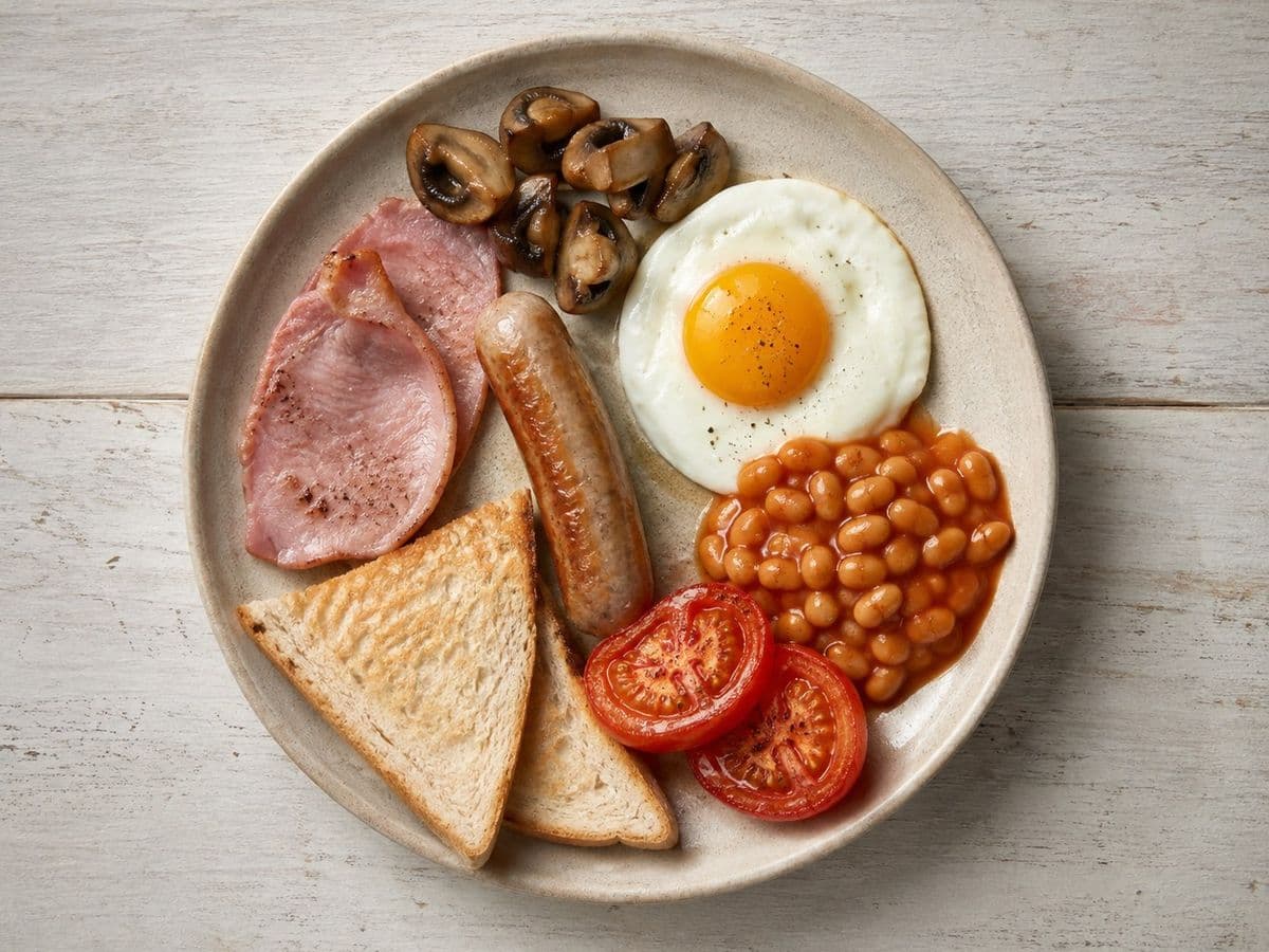 Full English Breakfast, plated as one serving.