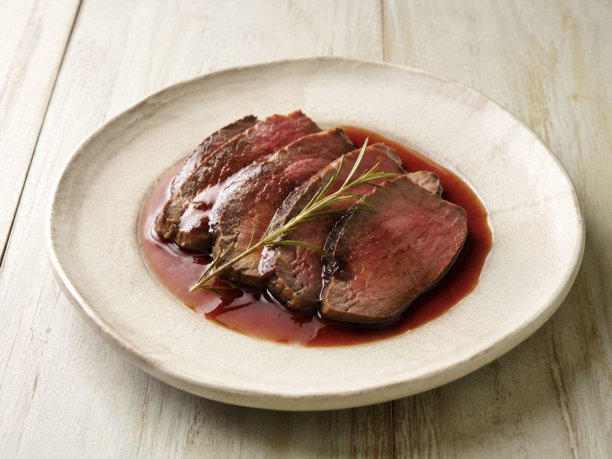 Roast Venison Haunch, plated as one serving.