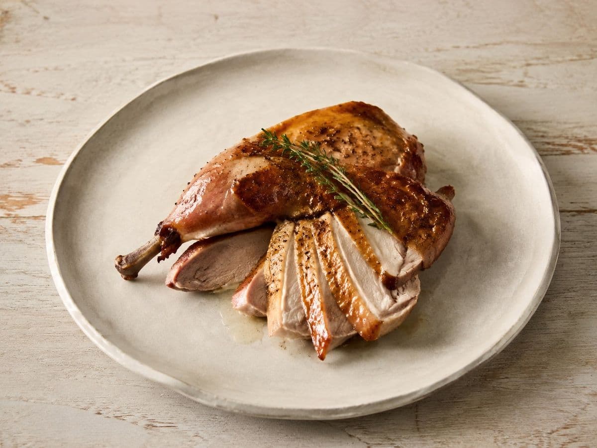 Roast pheasant, plated as one serving.