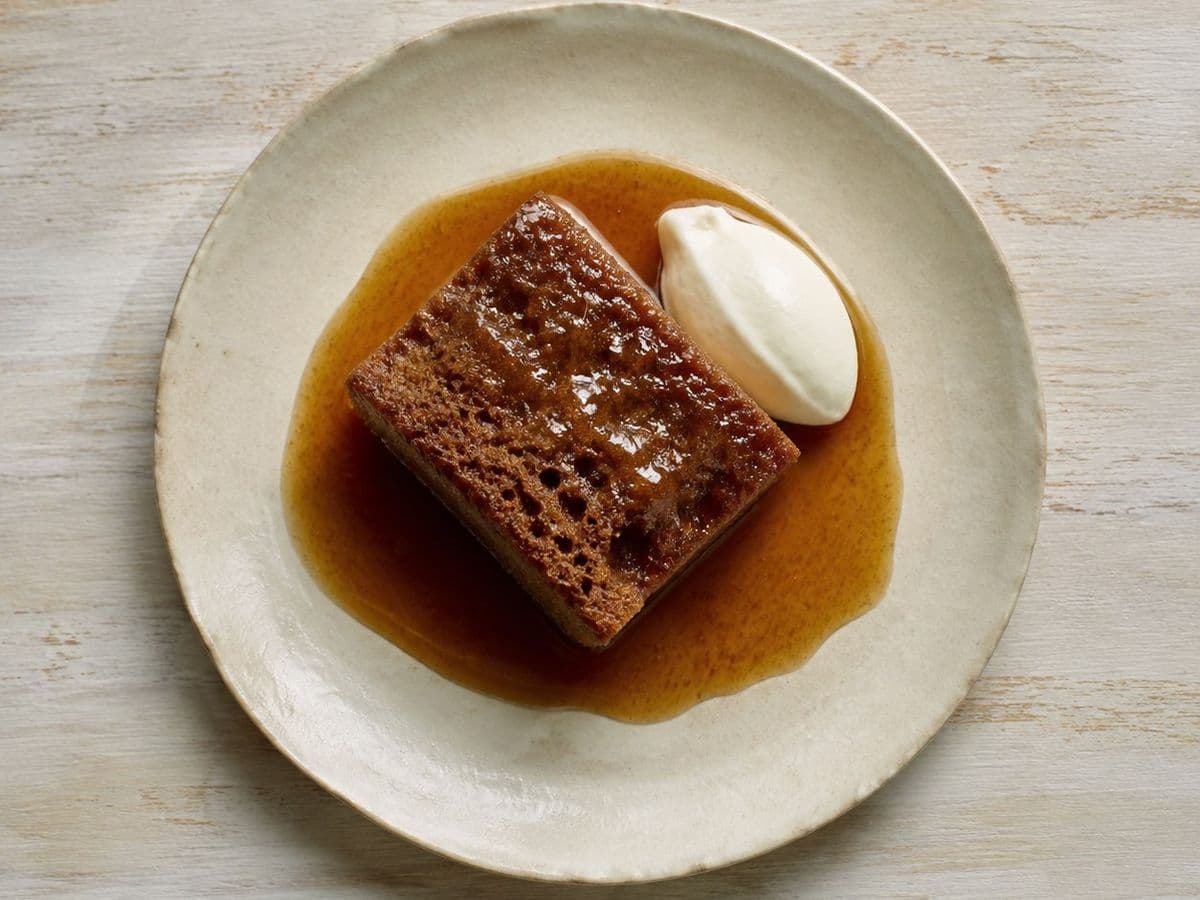 Treacle sponge, plated as one serving.