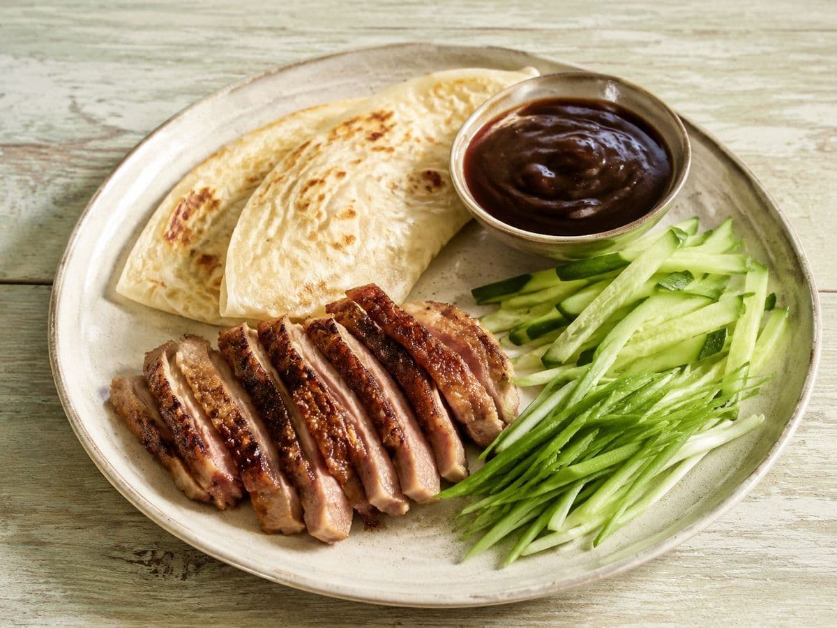 Crispy Aromatic Duck, plated as one serving.