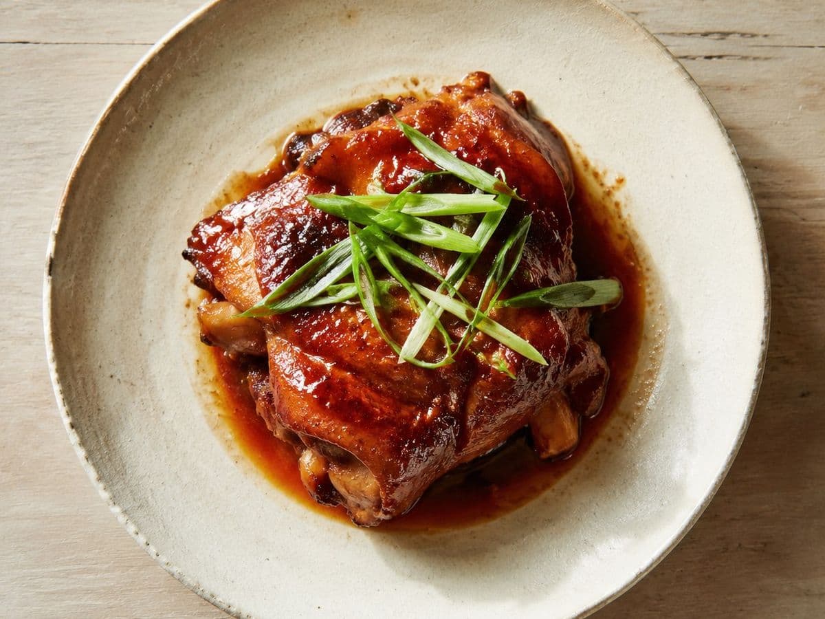 Red-Braised Chicken, plated as one serving.