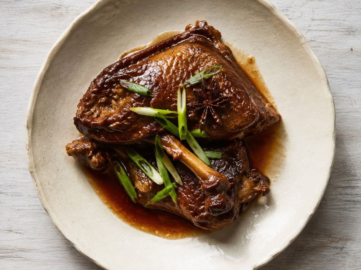 Braised Duck with Star Anise, plated as one serving.