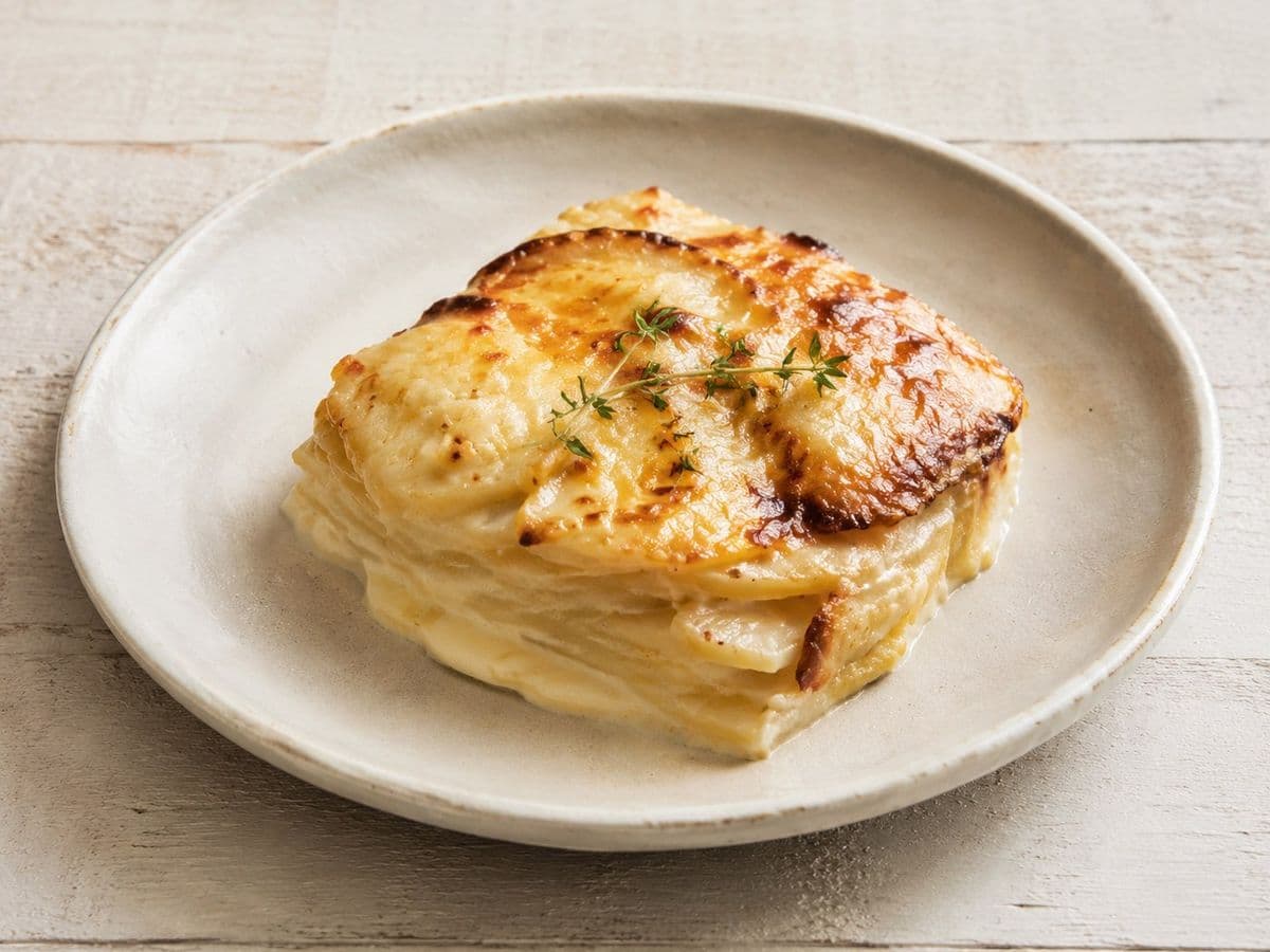Gratin Dauphinois, plated as one serving.