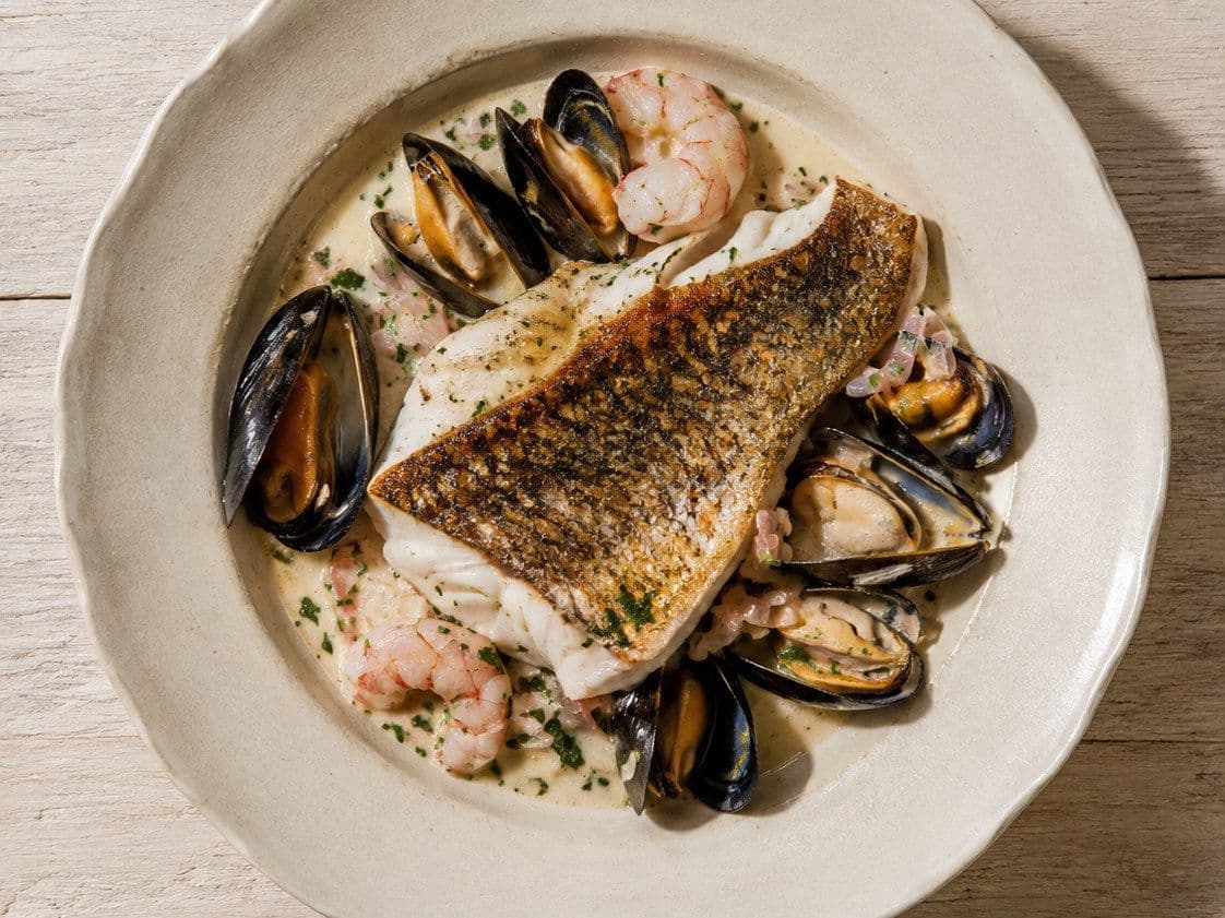 Sole a la Normande, plated as one serving.