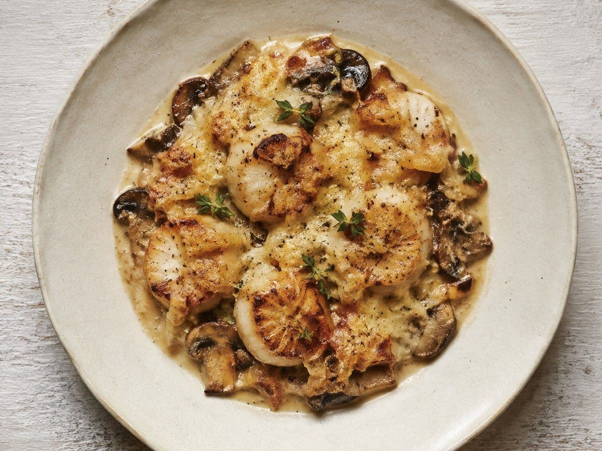 Coquilles Saint-Jacques, plated as one serving.