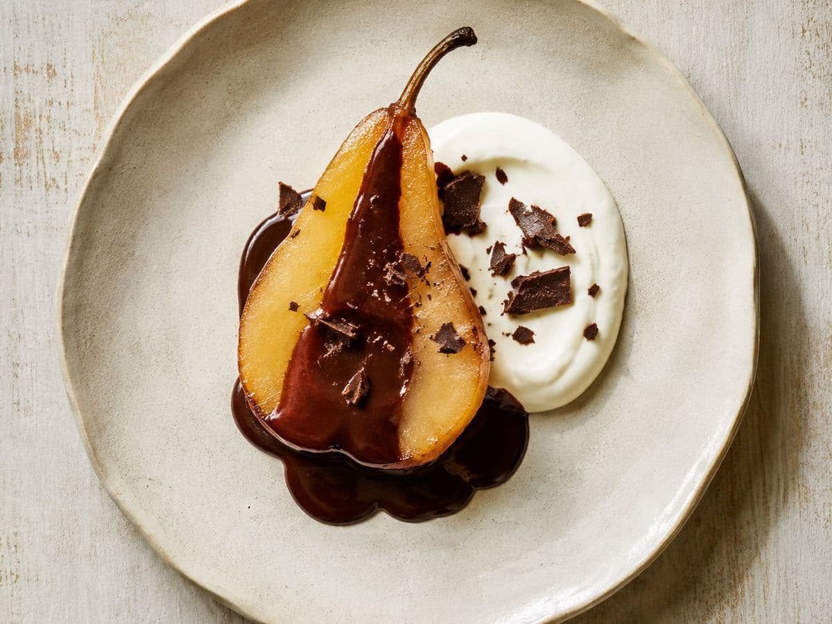 Poires Belle Helene, plated as one serving.