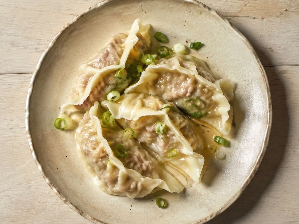 Gyoza, plated as one serving.