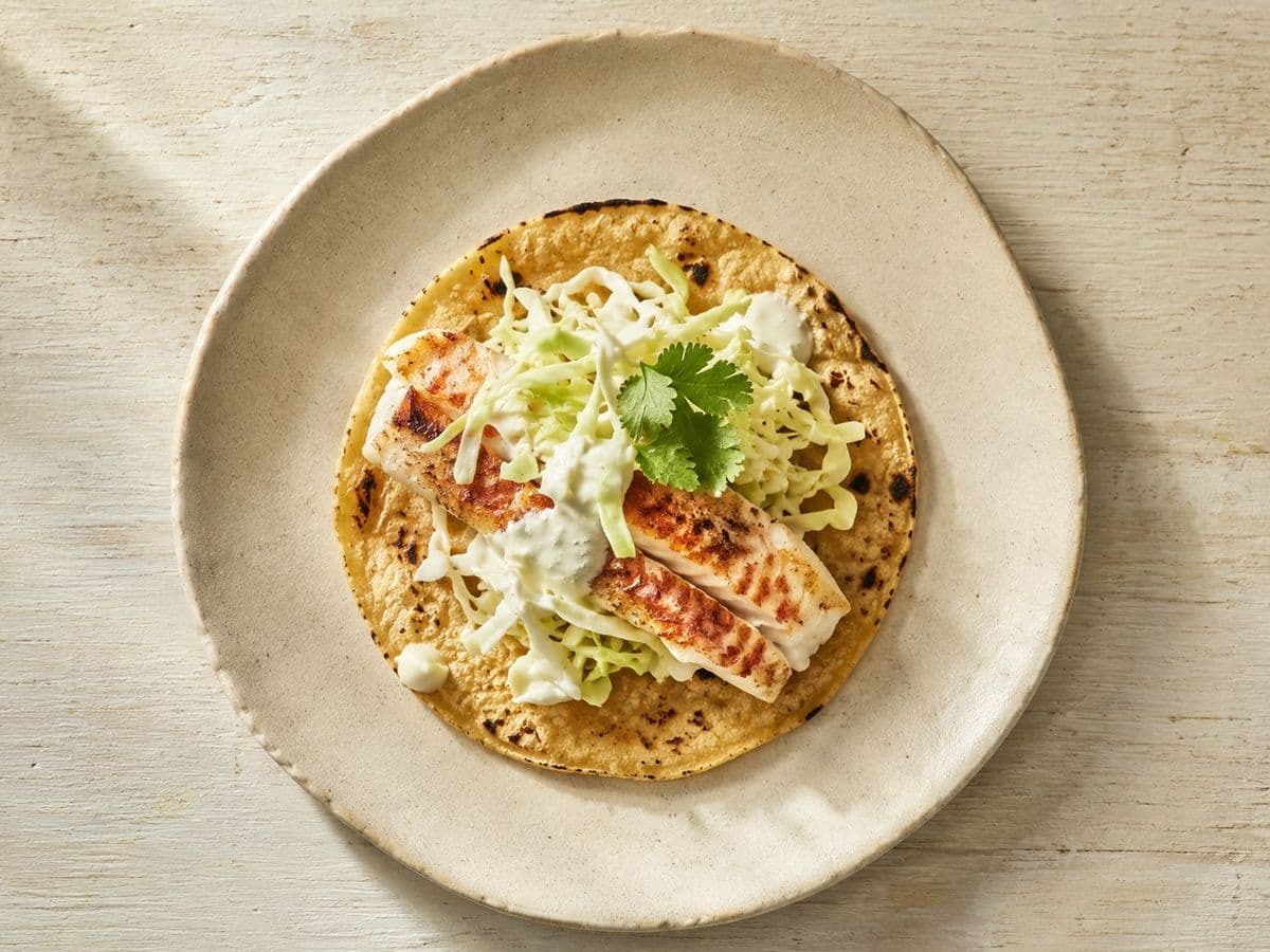 Tacos de Pescado, plated as one serving.