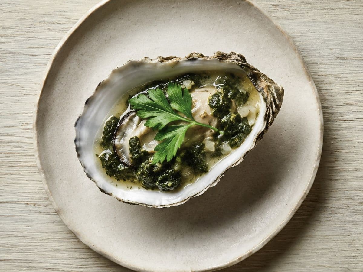 Oysters Rockefeller, plated as one serving.