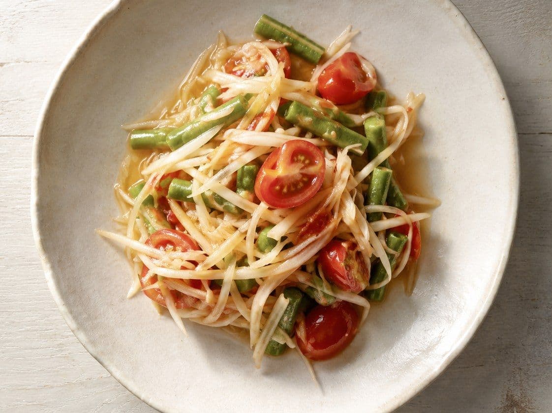Som Tam (Green Papaya Salad), plated as one serving.