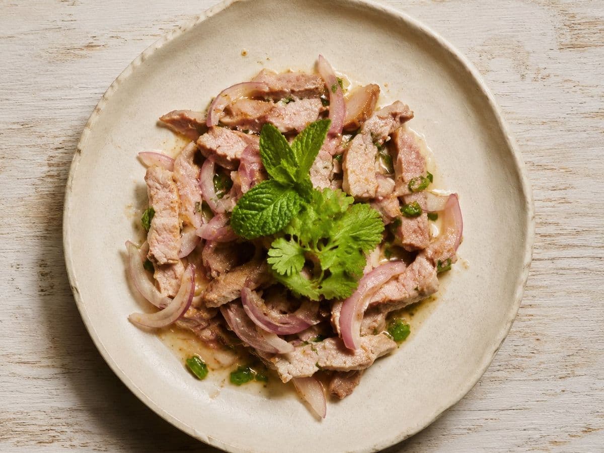 Grilled Pork Salad, plated as one serving.