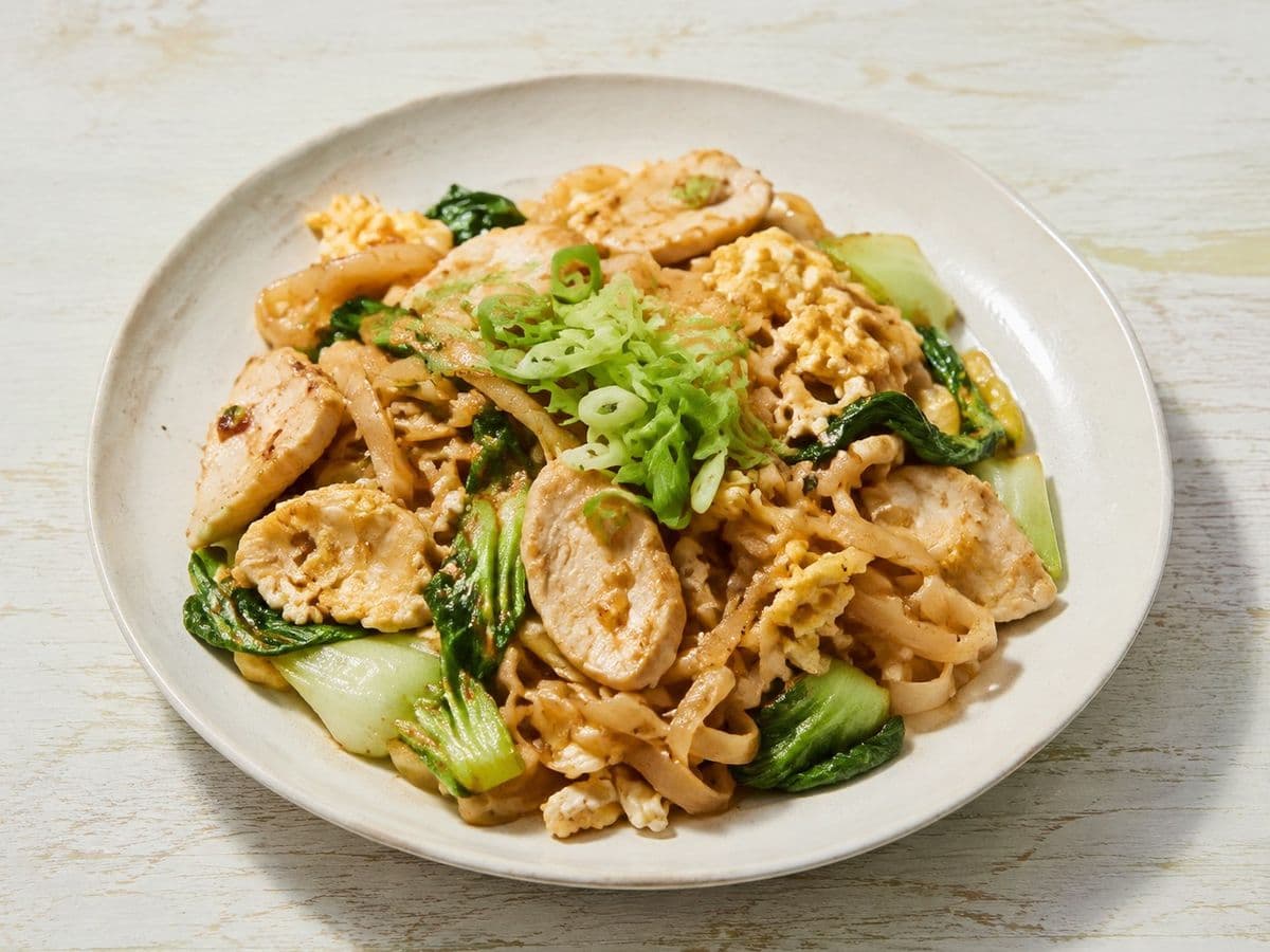 Spicy Stir-fried Rice Noodles, plated as one serving.
