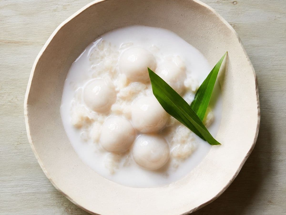 Glutinous Rice Balls in Coconut Milk, plated as one serving.